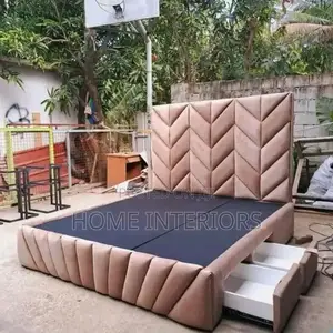 A Bed With a Two Storage Drawers