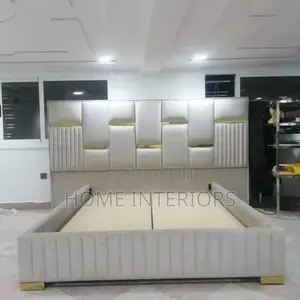 A Light Gray Colored Bed