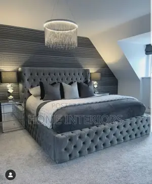 A Light Gray Bed With Luxury Mode