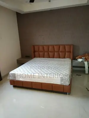 A Brown Leather Bed
