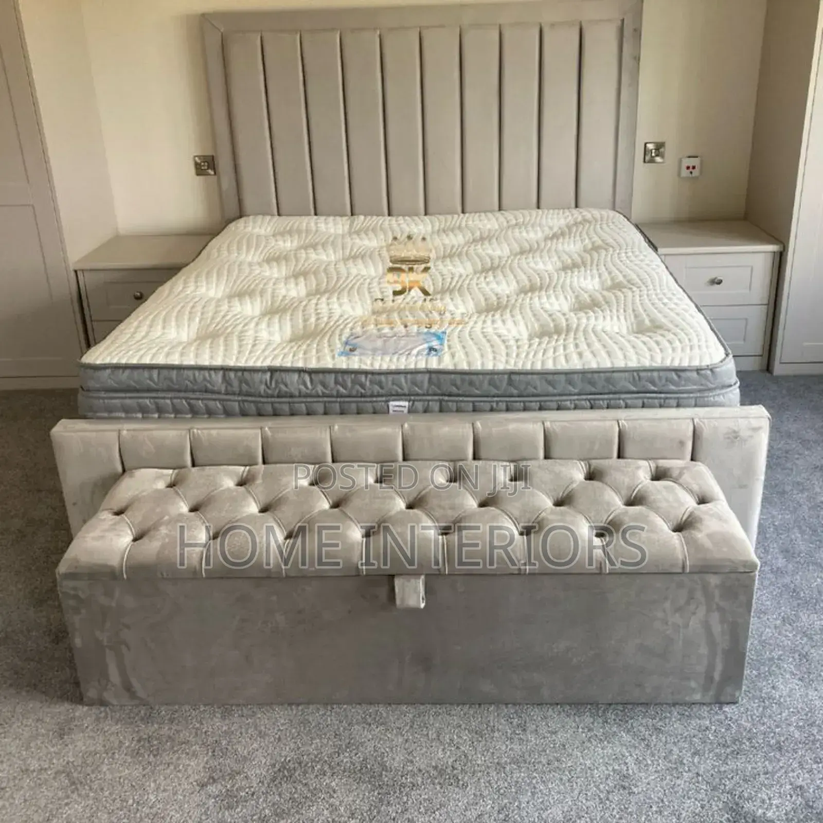 A Light Gray Colored Bed With Automan