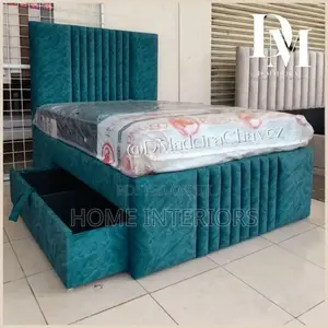 Light Blue Colored Bed With a Storage Drawer