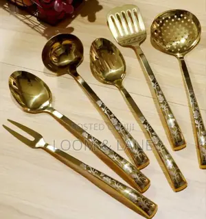 Stainless Steel Kitchen Utensil Set With a Stand