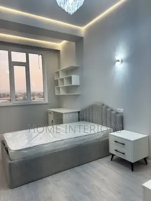 Light Gray Colored Bed With Two Storage Drawers
