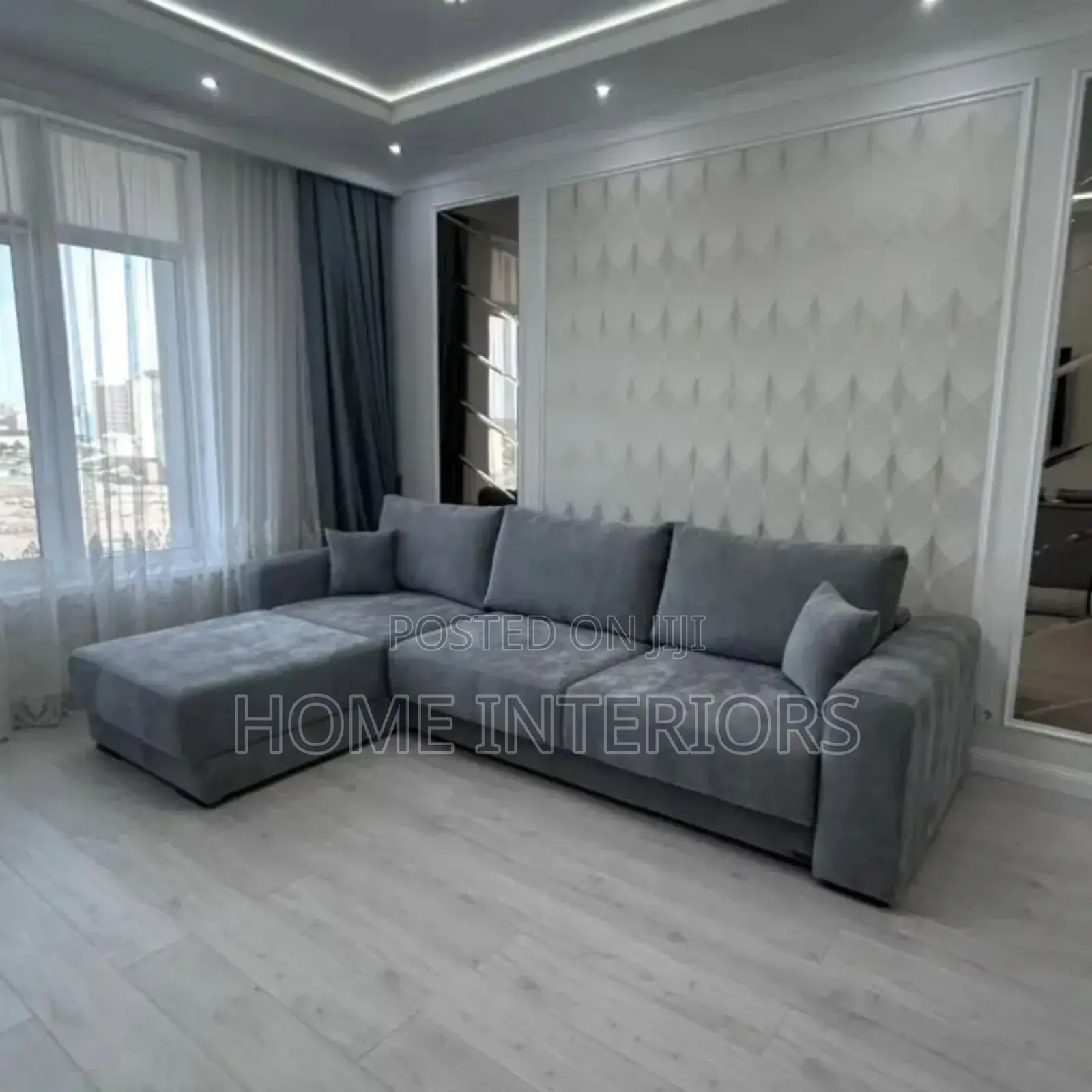 A Six Seater Gray Colored Sofa Set