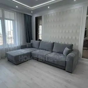 A Six Seater Gray Colored Sofa Set