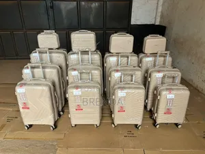 Brand New Sets of Classic Rubber Suitcases