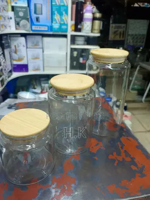 Clear Glass Storage Jars With Bamboo Lids.
