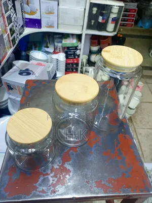 Clear Glass Storage Jars With Bamboo Lids.