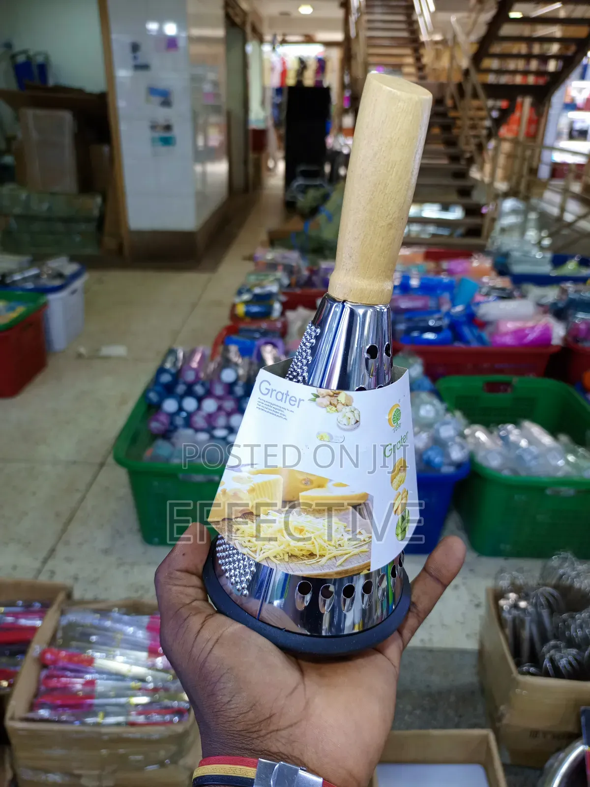 Conical Grater With a Wooden Handle.