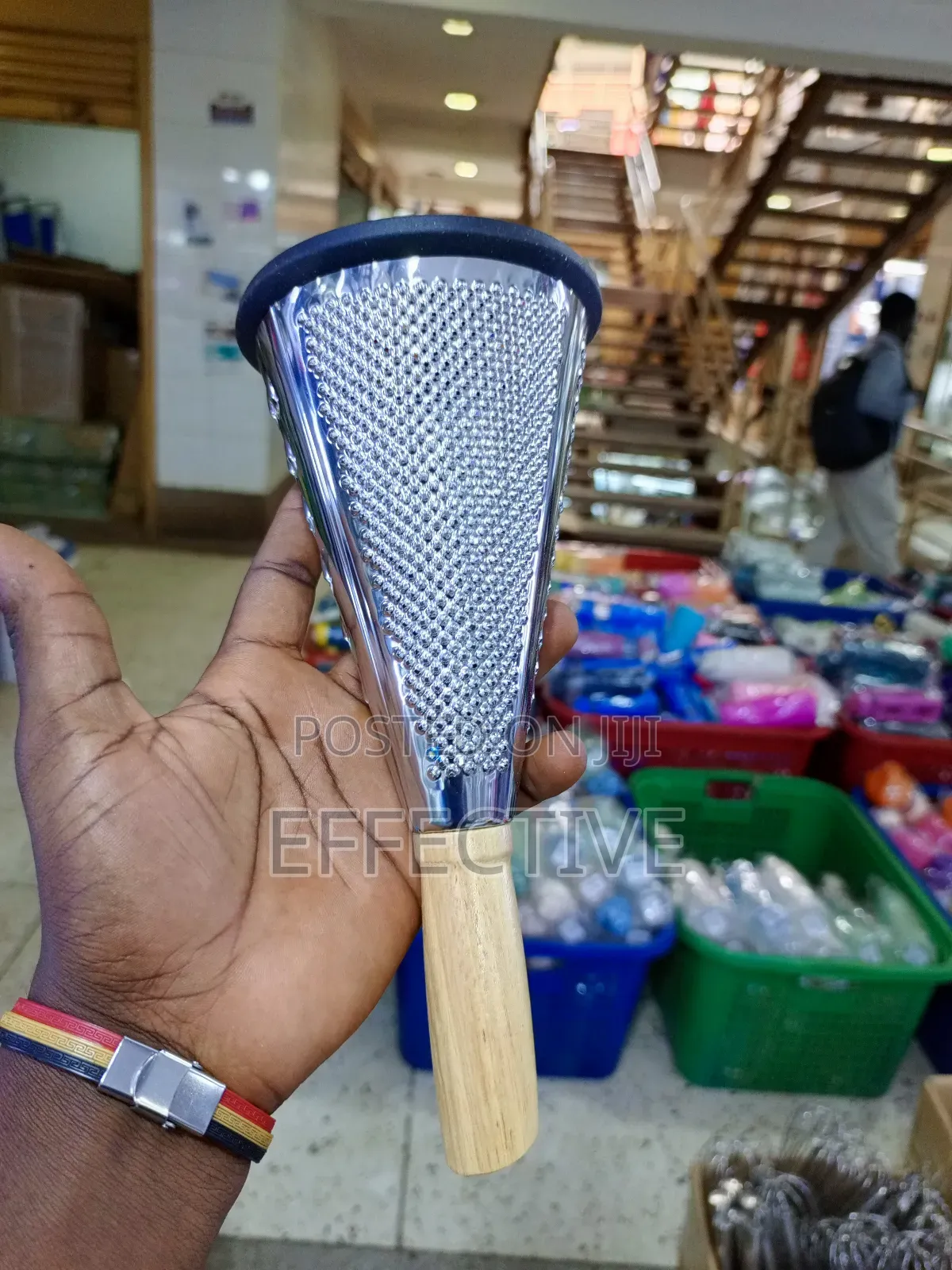 Conical Grater With a Wooden Handle.