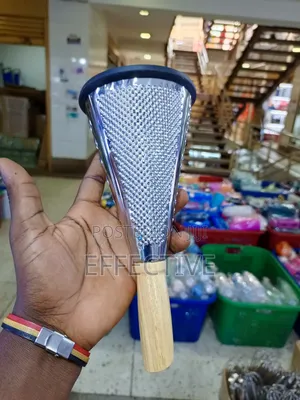 Conical Grater With a Wooden Handle.