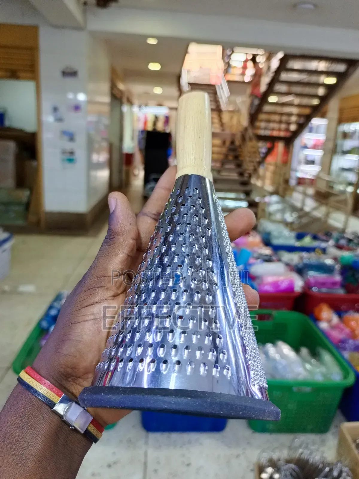 Conical Grater With a Wooden Handle.