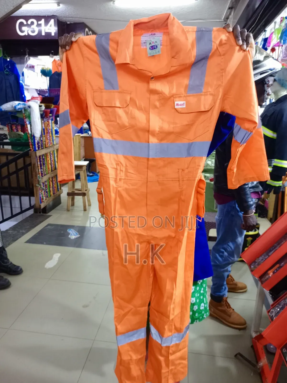 Coverall With Reflective Stripes.