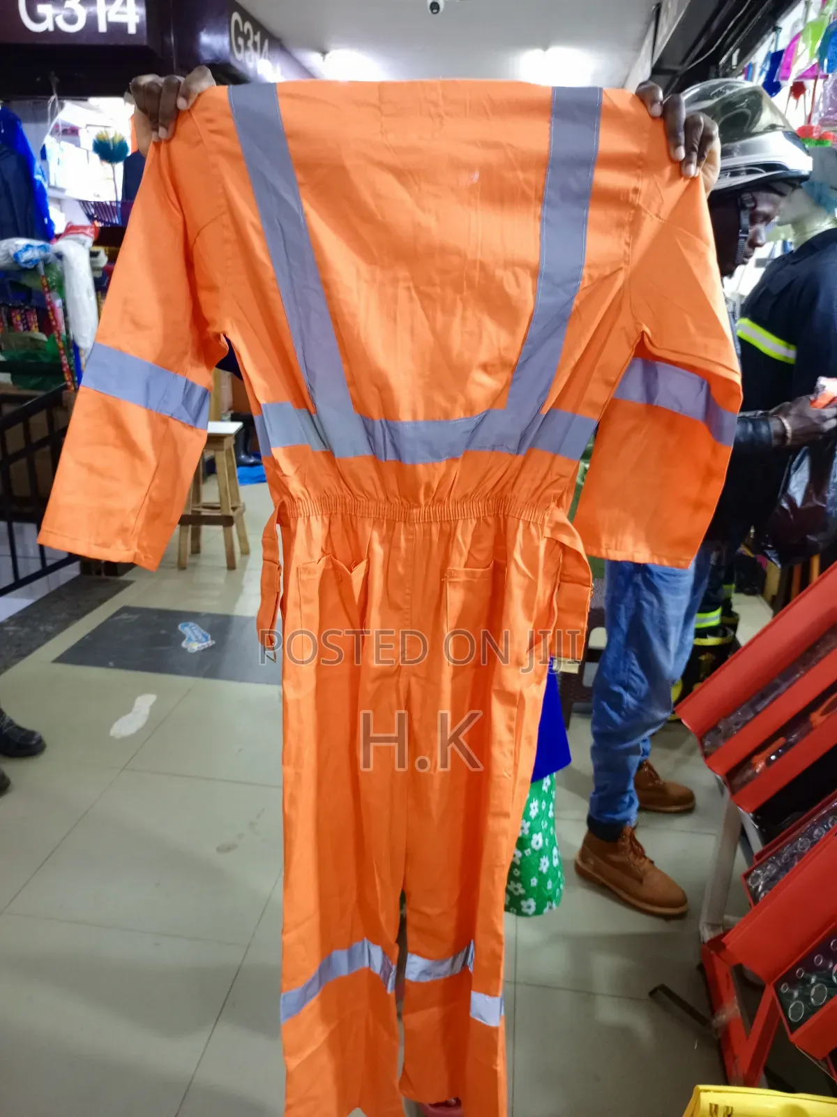 Coverall With Reflective Stripes.