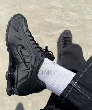 Nike Shox R4 Sneakers in a Triple Black