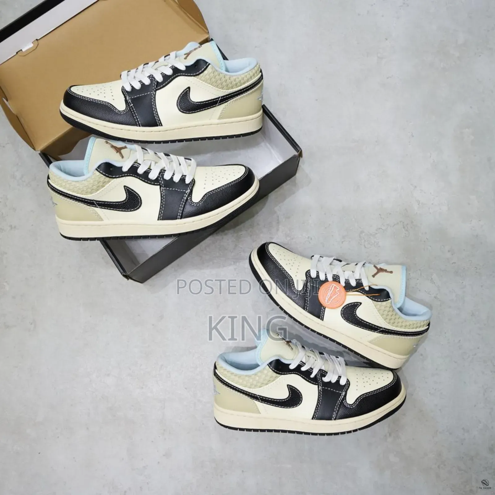 Nike Air Jordan 1 Low “Vintage Stealth Grey” Sneakers.