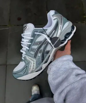 Asics Gel-Kayano 14 Sneaker in the "Pure Gold/Cold Moss"