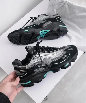 The New Balance 1000 "Black/Teal"