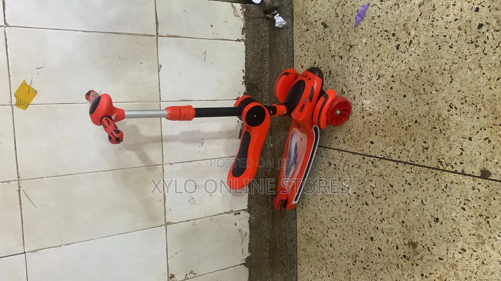 A 4 - Wheel Kick Scooter for Kids