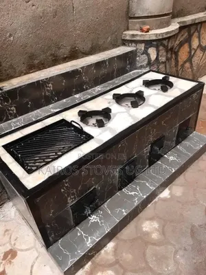 Energy Saving Stove for Firewood and Charcoal With a Grill
