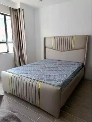 Modern Dressed 5x6 Leather Bed With Golden Designs