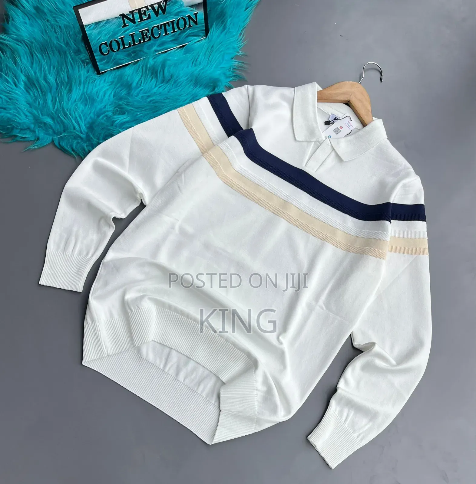 V Striped Pullover Sweater With a Polo Collar.