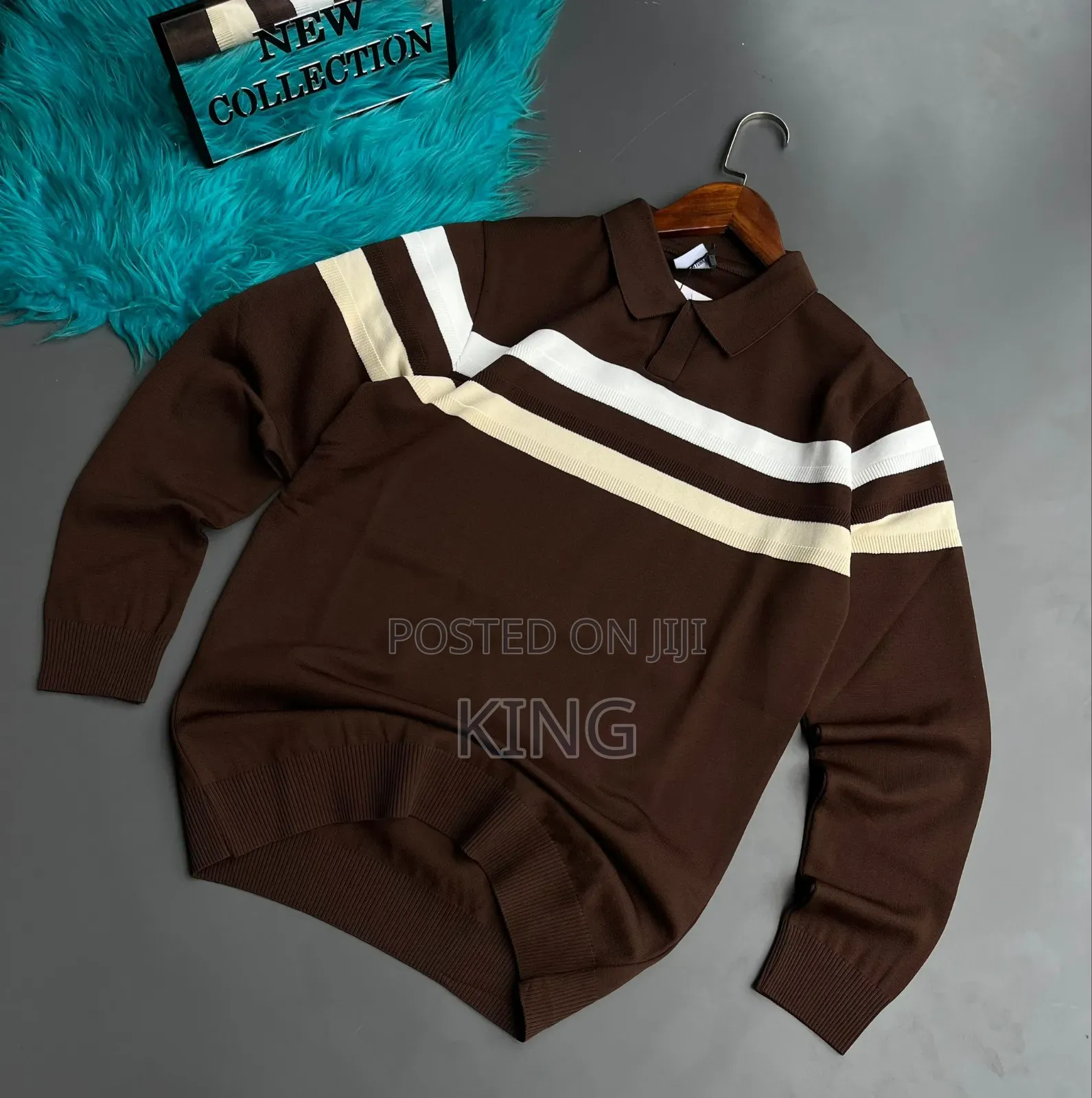 V Striped Pullover Sweater With a Polo Collar.