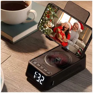 Phone Stand With Wireless Speaker And Alarm Clock.