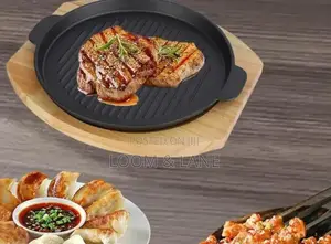 Cast Iron Grill Pan With a Wooden Base