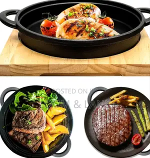 Cast Iron Sizzler Pan With a Wooden Serving Board