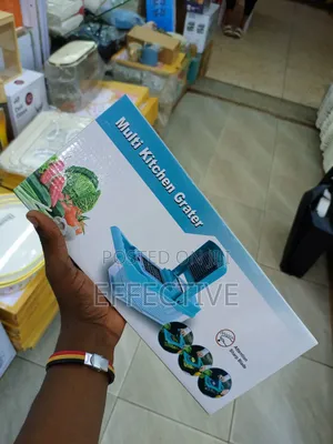 Multi-Functional Kitchen Grater and Vegetable Chopper.