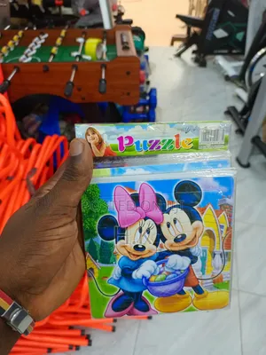 Jigsaw Puzzle Featuring the Disney Characters Mickey and Minnie Mouse.