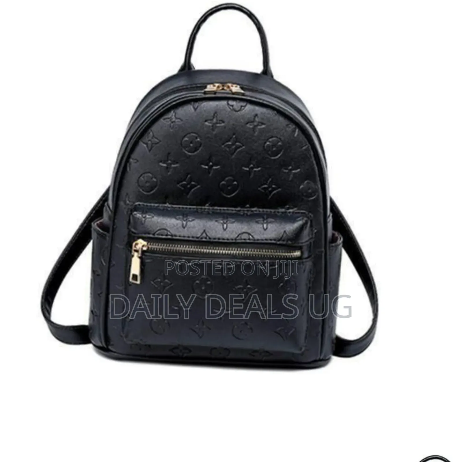 A Black Faux Leather Backpack With a Monogram Pattern