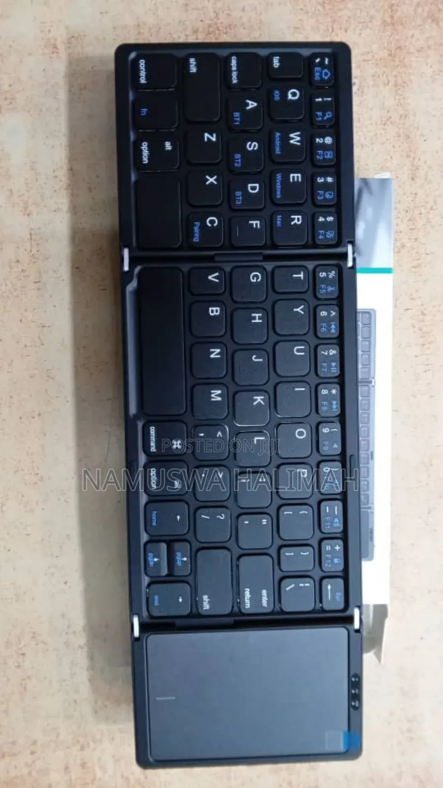 Foldable Bluetooth Keyboard With a Touchpad.
