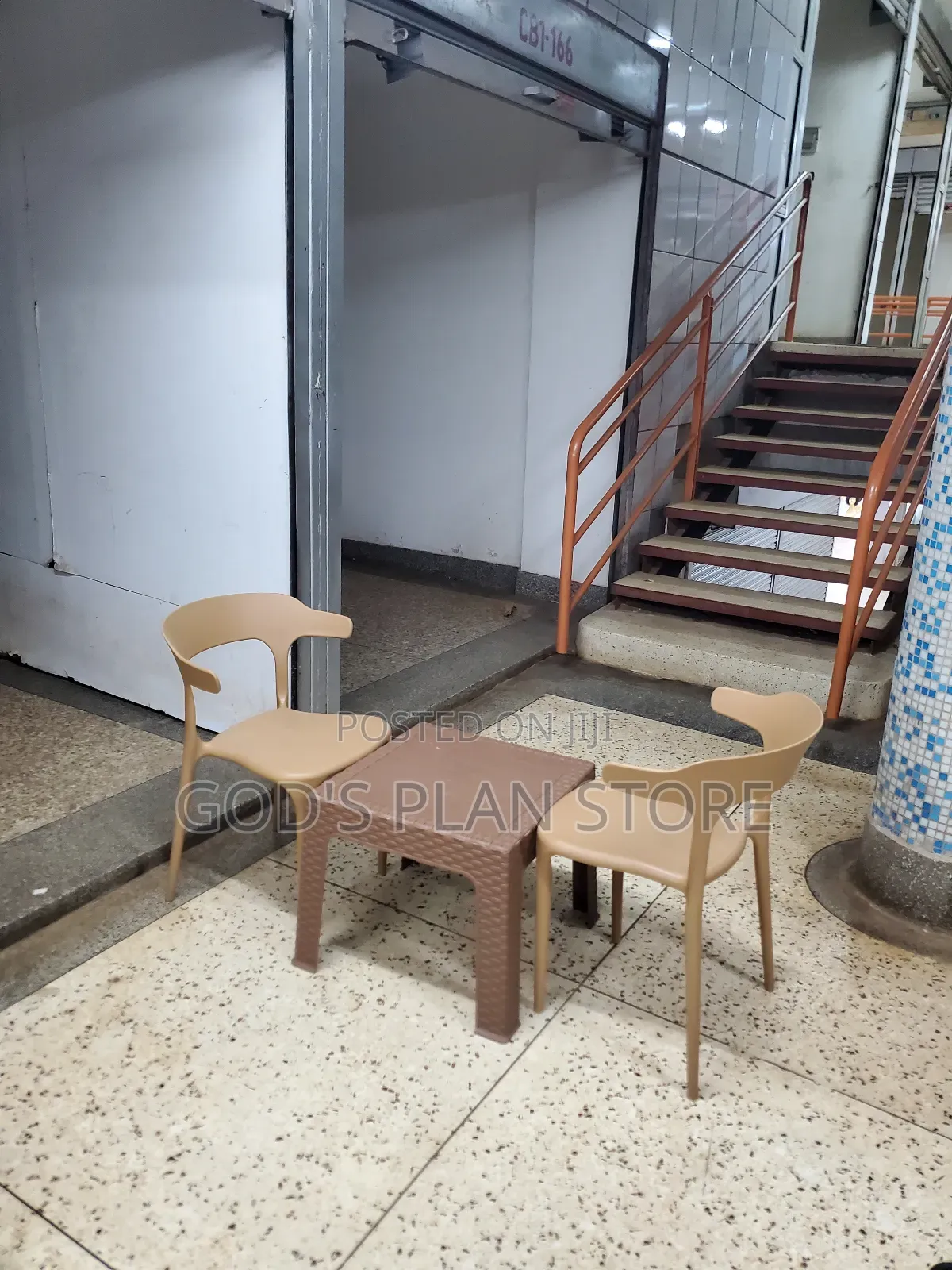 Ratten Coffee Table and Plastic Chairs