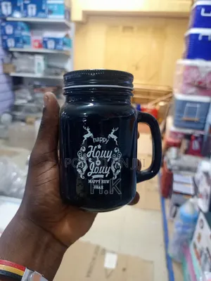 Black Glass Mason Jar Mug With a Handle and a Lid.