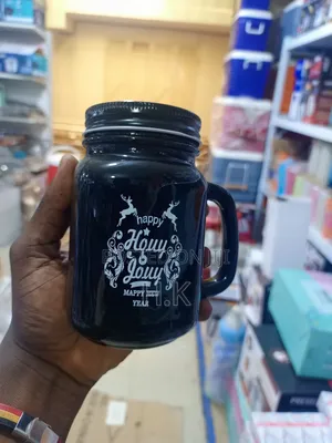 Black Glass Mason Jar Mug With a Handle and a Lid.