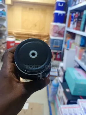 Black Glass Mason Jar Mug With a Handle and a Lid.