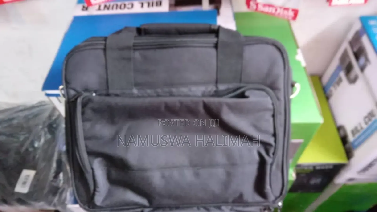 Black Carrying Case, Likely for a Laptop or a Projector.