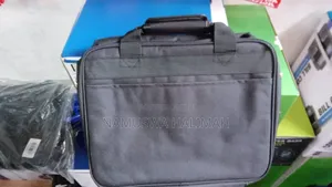 Black Carrying Case, Likely for a Laptop or a Projector.