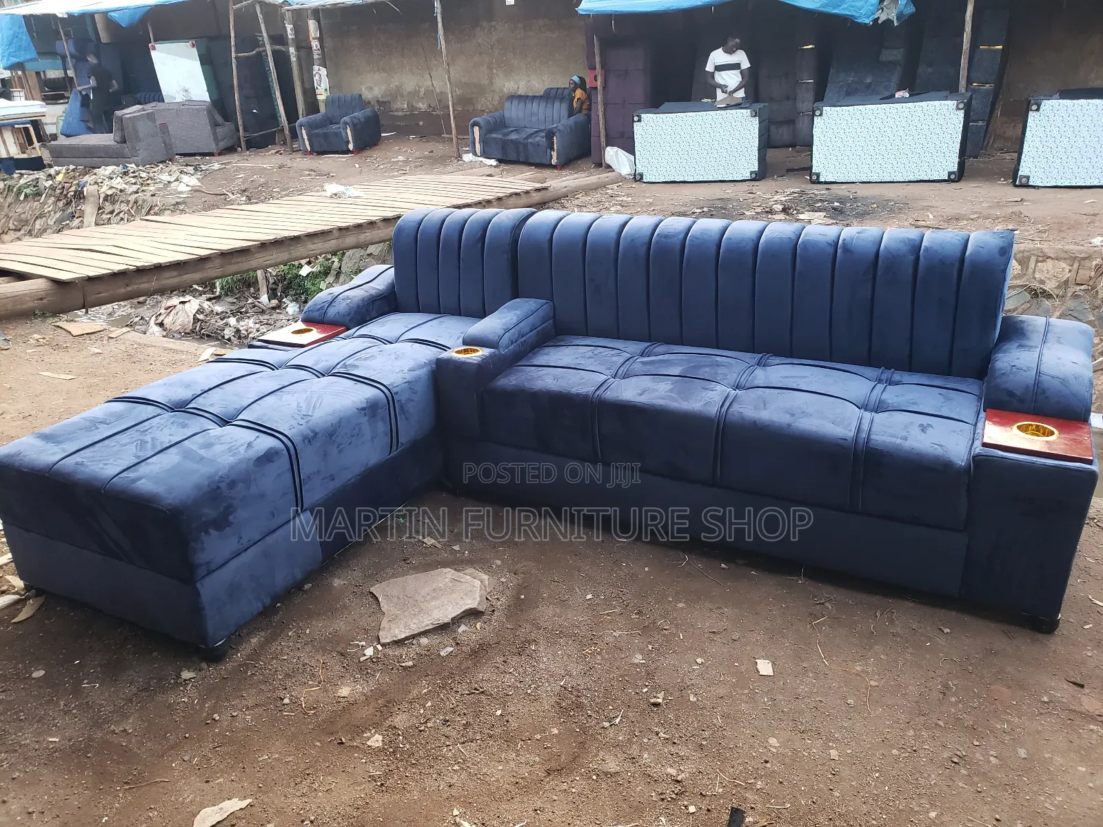Well Designed L Sofa Set Dark Blue in Colour With a Single Kabin