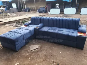 Well Designed L Sofa Set Dark Blue in Colour With a Single Kabin
