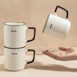 A Dozen Of Beautiful Ceramic White Mugs With A Black Ring