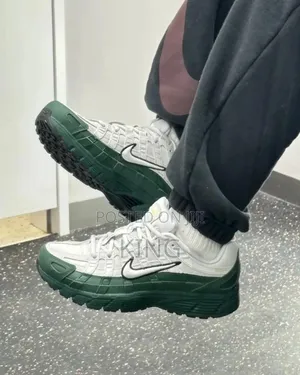 Nike P-6000 PRM Sneaker in the "Vast Grey/Fir Green" Colorway.