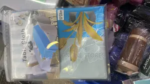 A 4 Seater Table Cloth With Blue and Gold Floral Design