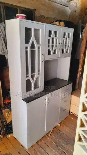 Well Finished Cupboard in Light Gray and Black With Drawers and Unique