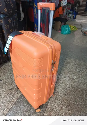 Traveling Plastic Suitcase in Medium Size