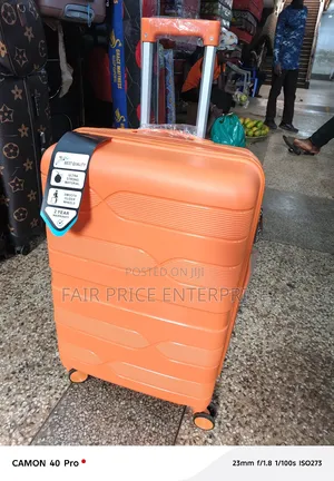 Traveling Plastic Suitcase in Medium Size