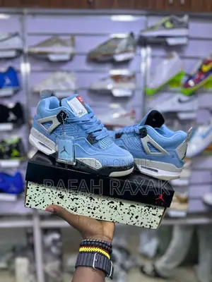 Nike Air Jordan 4 Retro “University Blue” Sneakers